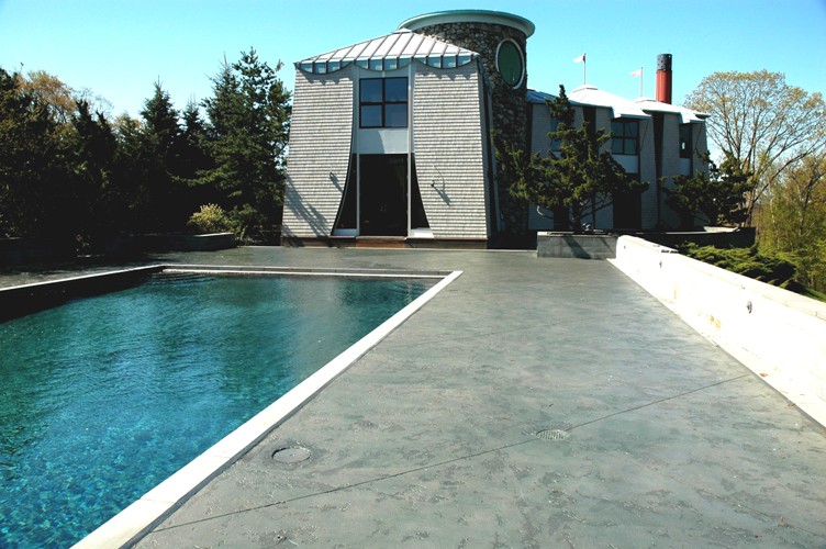 https://www.customconcretesolutionsct.com/wp-content/uploads/2019/04/Pool_Deck_Redding2.jpg